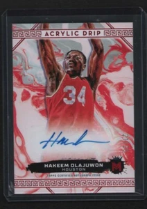 2023-24 Topps Motif Hakeem Olajuwon Acrílico Goteo Automático/25 Salón de la fama - Imagen 1 de 2