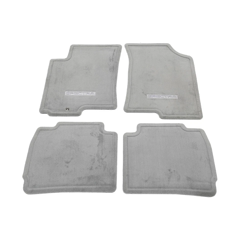 Juego de 4 alfombrillas grises OEM NUEVAS para Kia Spectra P8140-2F000LA 2003-2007 Foto 1 de 4