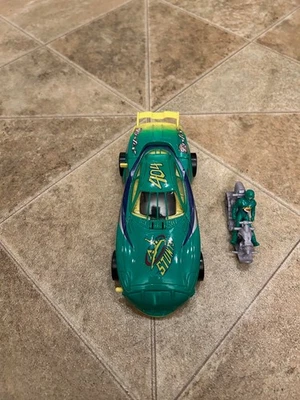 Hasbro NASCAR Racers "Stunts" Carlos Rey 404 figure + car - Image 1 of 4