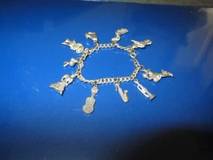Vintage Charm Armband, 10 Charms Musical Thema silber Farbe - Bild 1 von 2