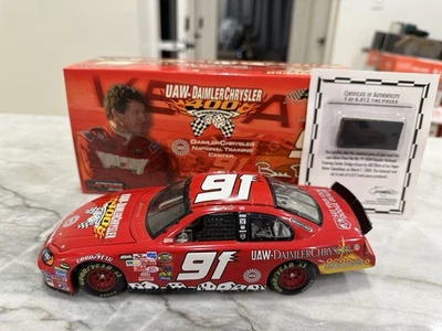 Bill Elliott 2004 Daimler Chrysler / UAW Nascar 1/24 Diecast W/ Tire Piece Dodge - Image 1 of 4