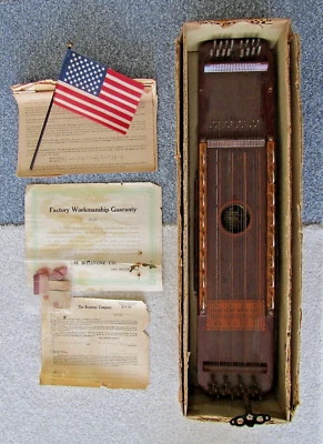 Bosstone Ukelin antique with papers & key - Image 1 of 4