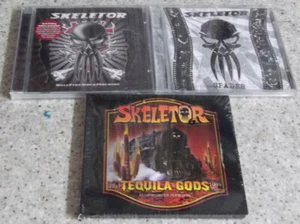 3 x SKELETOR - Hell Fire Rock 'n' Roll, Spader & Tequila Gods / Alle Neuware CDs - Bild 1 von 2