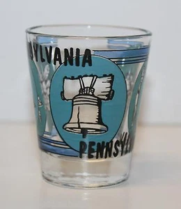 SHOT GLASS PENNSYLVANIA,TEAL/BLACK LIBERTY BELL,STATE FLOWER,HORSE & BUGGY - Picture 1 of 5
