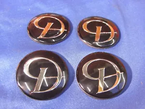 DAIMLER WHEEL HUB CAP BADGE BLACK WITH CHROME 'D' FITS XJ XJ40 C2C28742 SET OF 4 - Picture 1 of 1