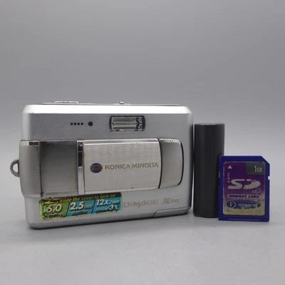 Konica Minolta Digital Camera Dimage X60 5.0MP Silver Tested With Battery and SD - Image 1 of 4