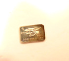 very small novelty 1 gram .999 fine silver rectangular token w/ eagle, trident