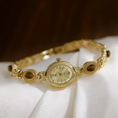 Винтажные золотистые женские часы с коричневыми каменными акцентами и элегантным браслетом подарок - Изображение 1 из 4