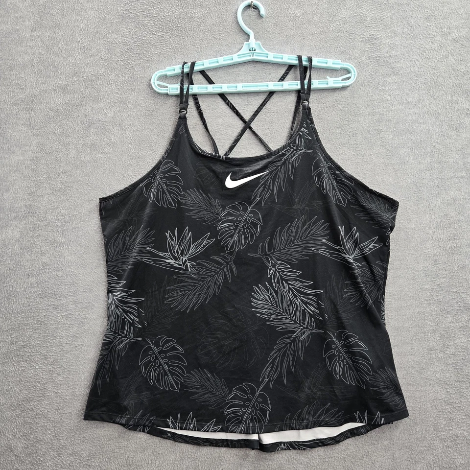 Camiseta sin mangas Nike para mujer 1X negra con estampado floral de hojas Dri Fit calce ajustado tropical Swoosh Foto 1 de 4
