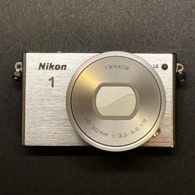 Nikon1 J4 Mirrorless Single Lens Double Zoom W Kit Silver 18.39 MP J4WZWH - Image 1 of 4