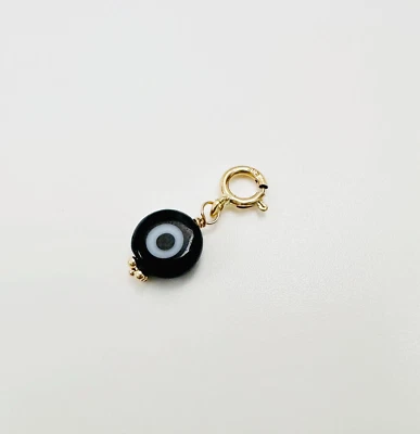 Colgante con dije de mal de ojo negro de vidrio millefiori de oro amarillo macizo de 14K de 6 mm con cierre Foto 1 de 4