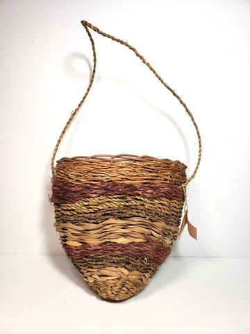 Handmade Hawaiian Woven Basket with Handle Artisan made from Maui Cover