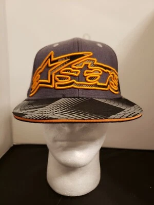 NUEVO CON ETIQUETAS Alpinestars Stars Elmore Gorra Plana Ajustada Gris/Naranja Pequeña/Mediana 1024-82000 Foto 1 de 4