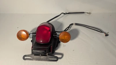 2007 Honda Chf50 Metropolitan Scooter OEM TAIL LIGHT TURN SIGNAL LISENCE BRACKET - Image 1 of 4