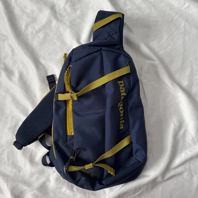 Bolso Bandolera Patagonia Atom 8L Azul Marino Amarillo Bandolera Mochila Exterior Foto 1 de 4