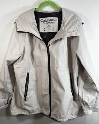 NUEVO SIN ETIQUETAS Calvin Klein Performance Mujer’s L Impermeable Tostado Crudo Capucha Cremallera Impermeable Foto 1 de 4