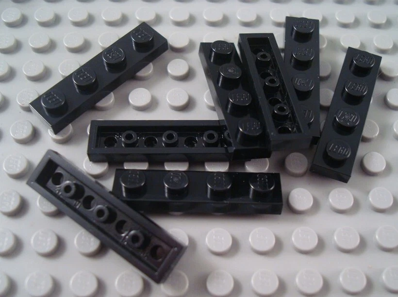 New LEGO Lot of 8 Black 1x4 Plate Pieces - Image 1 of 1