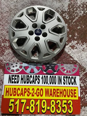 "Ford Focus 2012-14 tapacubos como nuevo perno OEM 16"" usado una tapa plateada nuevo despegue" Foto 1 de 4