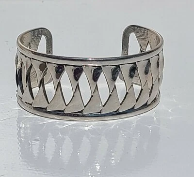 Brazalete Brazalete Lia Sophia "Shockwave" Tono Plata Individual Listones Retorcidos  Foto 1 de 4