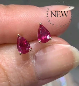 Ladies Pear Shape Ruby Stud Earrings - Picture 1 of 3
