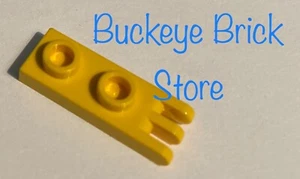 Lego GELBE SCHARNIERPLATTE 1 x 2 mit 3 Fingern am Ende - Bild 1 von 2