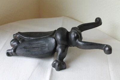 ancien tire-bottes en fonte de fer poids :1,3 kg - Photo 1/4