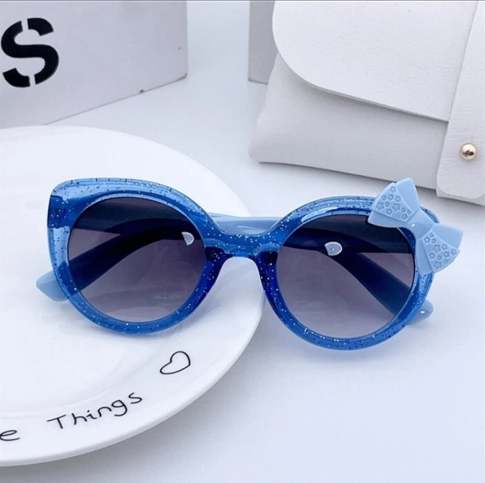Gafas de sol niños niñas brillo rosa arco boutique accesorio ojo de gato azul Foto 1 de 1