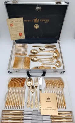sBs: Besteck für 12 Personen im Koffer, vergoldet 23/24-karätig - Bild 1 von 4