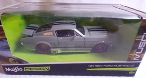 MAISTO DESIGN 1:24 SCALE 1967 FORD MUSTANG-GT #32451. STILL STRAPPED IN BOX - Picture 1 of 10