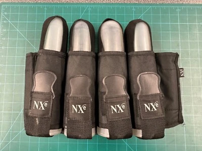 NXE paintball harness. Includes 4 140 rd flip top tubes. RARE! - Image 1 of 4