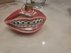 BRAPPETTE ORNAMENTO DENTI ROSA E BLU SORRISO - Foto 1 di 2