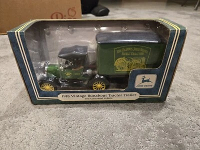 JOHN DEERE 1918 RUNABOUT TRACTOR TRAILER W/ Storage Unit sealed - Image 1 of 4