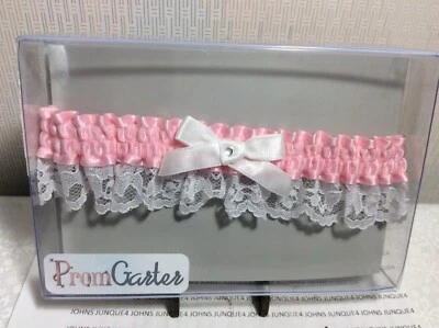 WEDDING OR PROM GARTERS New in plastic casing PINK GARTER with White Bow w/stone - Image 1 of 2