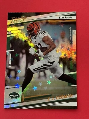 2022 Panini Prestige C.J. Uzomah Xtra Points Astral #62 New York Jets  - Image 1 of 2