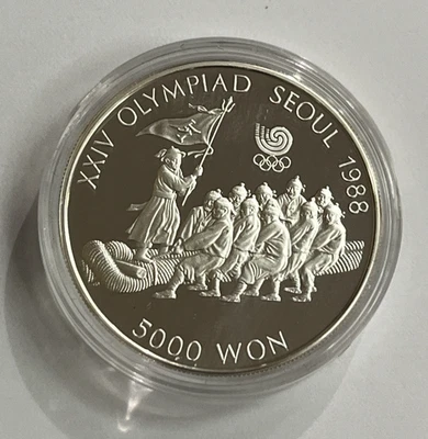 1986 SOUTH KOREA XXIV OLYMPICS TUG OF WAR 5000 WON 925 SILVER PROOF COIN - Image 1 of 2