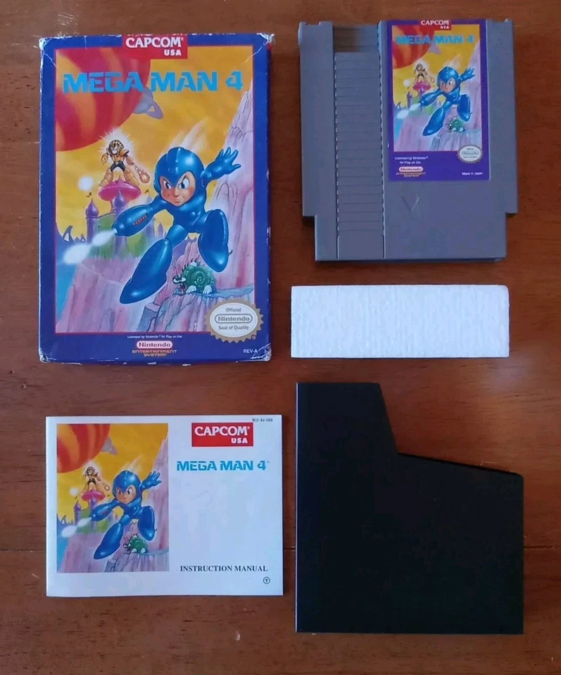 Nintendo NES Mega Man 4 (NES 1992) CIB Complete w/ Manual, Styro, Sleeve - NICE! - Image 1 of 4