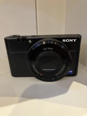 SONY CYBER SHOT CYBERSHOT DSC RS100 20.2 mp CARL ZEISS WITH CASE NEW BATTERY  - Image 1 of 4