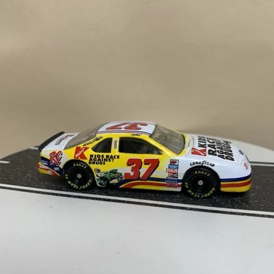 Revell Racing #37 Jeremy Mayfield Kmart Kids Race Against Drugs Ford White 1/64  - Image 1 of 4