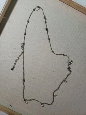 Серебряное ожерелье с камнями H и M - Изображение 1 из 3