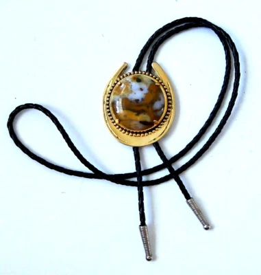 Corbata Bolo vintage con hebilla de metal de piedra pulida con cordones de cuero Foto 1 de 4