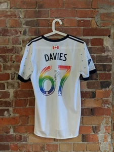 ALPHONSO DAVIES SIGNED PRIDE RAIN JERSEY AUTO W/ VWFC COA *PROCEEDS TO CHARITY* - Picture 1 of 6