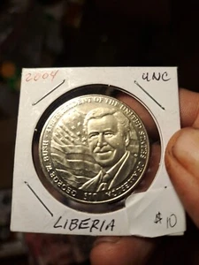 2004..10$ Liberia Coin. Goerge Bush Uncirculated Coin - Picture 1 of 2