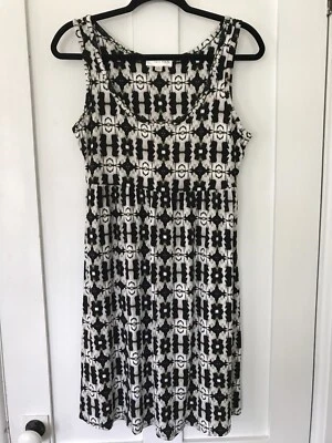 Kenar Tejido Camiseta Sin Mangas Vestido Sin Mangas, Cintura Alta, Blanco y Negro, Talla Mediana Foto 1 de 4