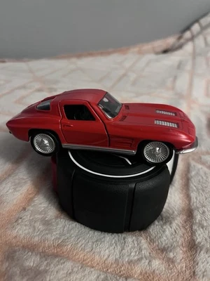 1:36 1963 Chevy Corvette Diecast Model Car w/ Open Doors & Pull Go Action - Image 1 of 4