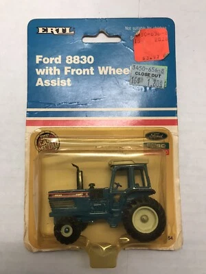 ERTL Ford 8830 Cab Tractor with Front Wheel Drive Assist No 854 New - Image 1 of 4