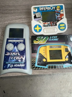Tiger Electrinics Konami Handheld Game Lot Star Trek Paperboy 3d Lcd Fighter - Image 1 of 4