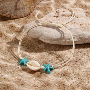 Juego de pulsera anudada hecha a mano bohemia de temática náutica con concha y estrellas de mar - Imagen 1 de 2