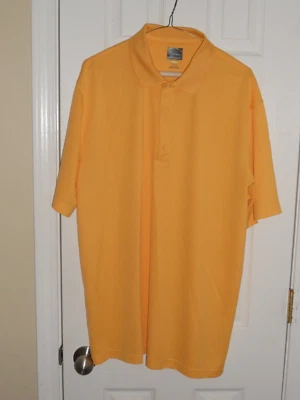 Camisa de golf Greg Norman Play Dry All Poly dorada XL Foto 1 de 4