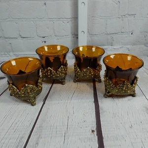 Difícil de encontrar 4 candelabros votivos base ornamental de metal abeto vidrio color ámbar 3 pulgadas - Imagen 1 de 16
