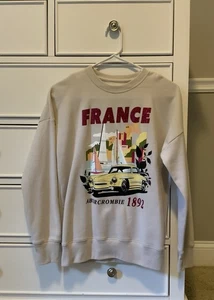 Abercrombie Kids- Size 11/12 (Tan) Girls Legging Friendly ‘France’ Sweatshirt - Picture 1 of 3